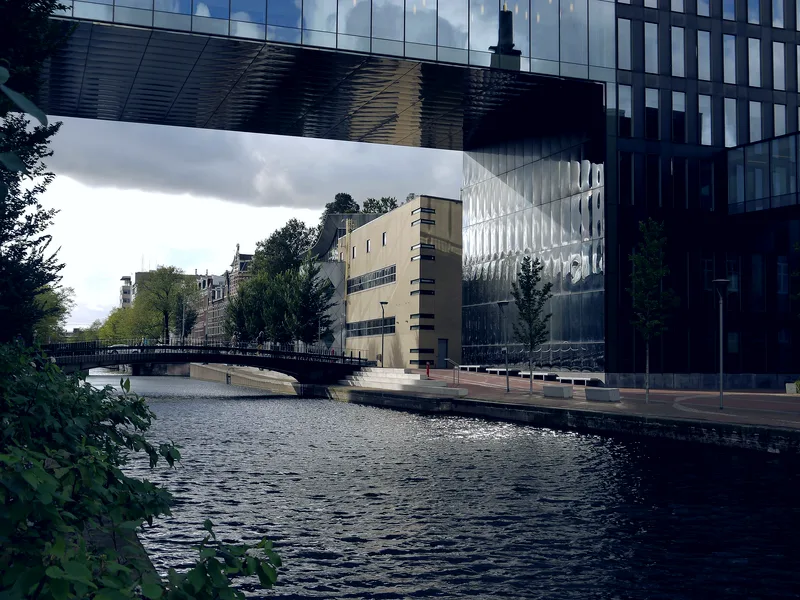 Reflecting glass architecture at Roeterseiland campus, Amsterdam